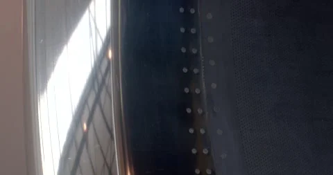 Shiny aircraft engine shield with rivets during maintenance process Stock Footage 333877428