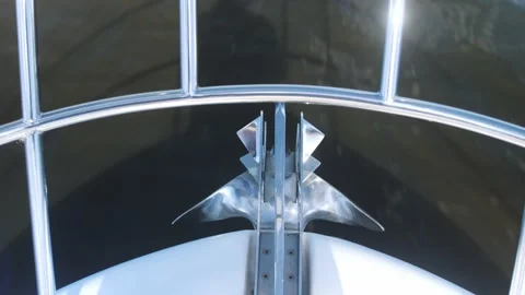 Shiny anchor and roller on white yacht bow with railing Stock Footage 138728116