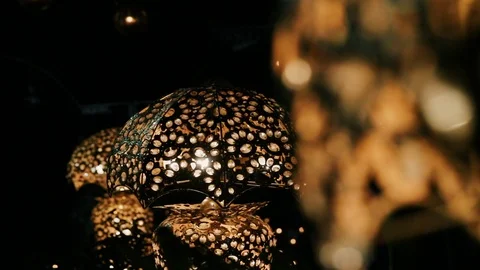 Shiny background of lluminated Beautiful Lighting Lamps. Closeup View. Video stock 107390366