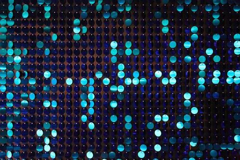 Shiny background texture, a set of round blue sequins like fish scales Stock Photos