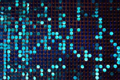 Shiny background texture, a set of round blue sequins like fish scales Stock-Fotos