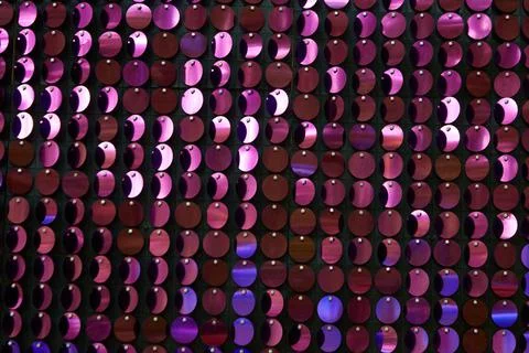 Shiny background texture, a set of round purple sequins like fish scales Stock-Fotos