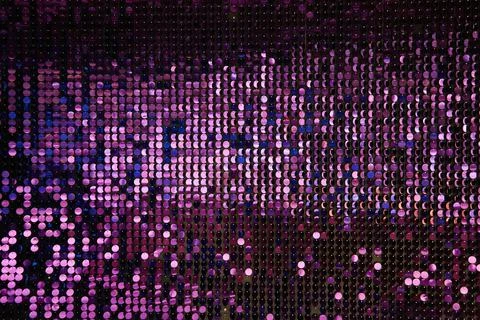 Shiny background texture, a set of round purple sequins like fish scales Stock Photos