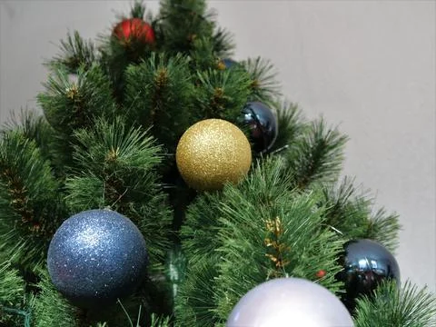 Shiny balls on the tree as decor elements 스톡 사진