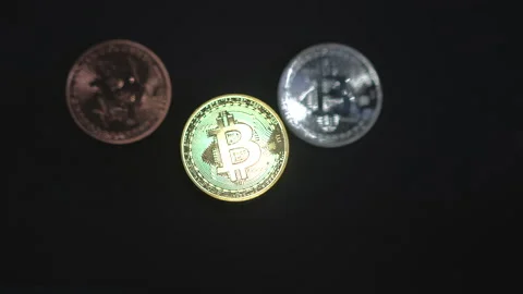 Shiny Bitcoin light moving through reflection on black background video wealt Stock Footage 157382421