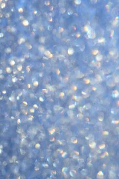 Shiny blue background round sequins blurred Defocused Stock Photos