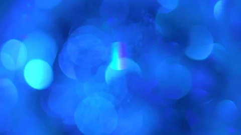 Shiny blue background. Shot with blurred focus. Video stock 119982812