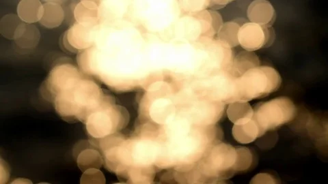 Shiny bokeh abstract background from light reflect sunset on river Stock Footage 73069460