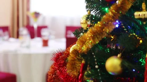 Shiny christmas tree decorations and served table, variable focus Video stock 276363011