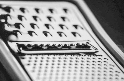 Shiny chrome kitchen grater close up Foto stock