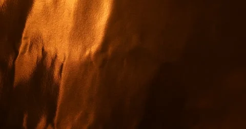 Shiny copper foil texture with warm golden metallic reflections Vídeos de archivo 345678498