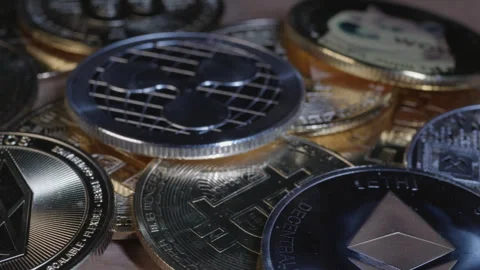 Shiny cryptocurrency coins in macro Stock Footage 295028784
