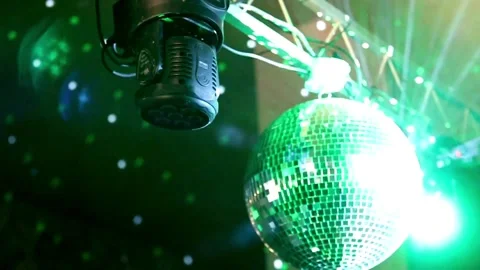Shiny disco ball with light reflection and rays in haze. Light reflecting f.. Stock Footage 265759665