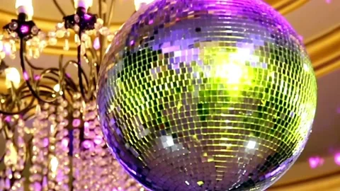 Shiny disco ball with light reflection and rays in haze. Light reflecting f.. Stock Footage 265760903