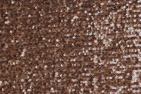 Shiny fabric with pink round inserts closeup Stock Photos