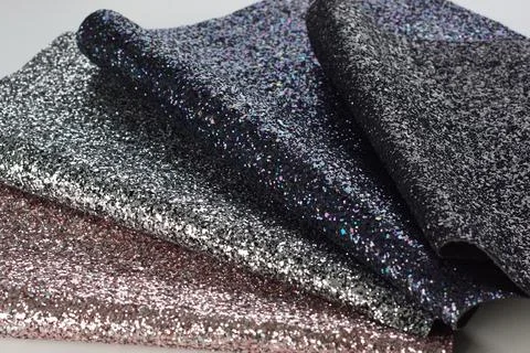 Shiny fabrics on a light background close-up Foto stock