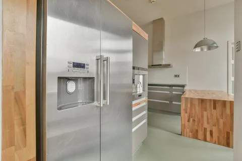 Shiny fridge in modern kitchen Foto stock
