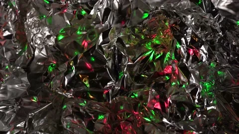 Shiny glitter silver background with multicolored lights Stock Footage 166528354