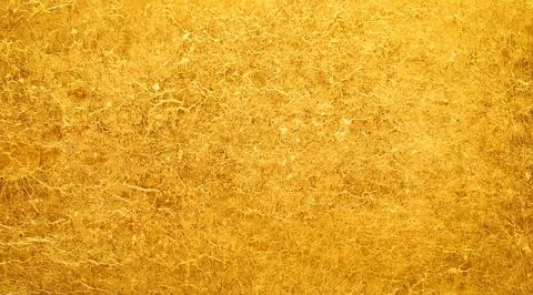 Shiny gold background made of rough textured gold paper. Stock Illustration
