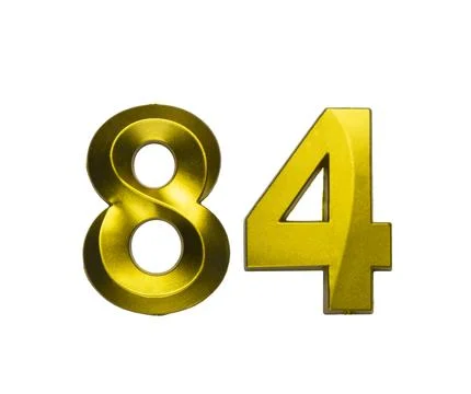 A shiny gold single number eighty-four with a swirling, reflective metallic.. Stock Photos