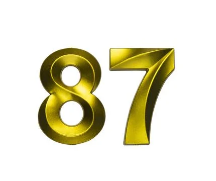 A shiny gold single number eighty-seven with a swirling, reflective metalli.. Stock Photos