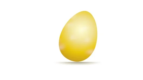 Shiny golden easter egg standing on white surface Stock Footage 303262557