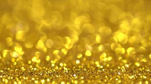 Shiny golden surface rotates Foto stock