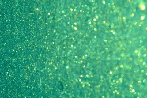 Shiny green background round sequins blurred Defocused Stock Photos