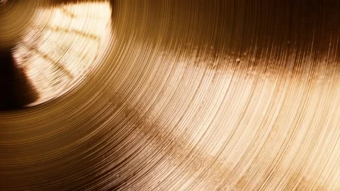 Shiny hand made drum plate. Closeup of cymbal for drums in the recording studio. Stock-Footage 201113655