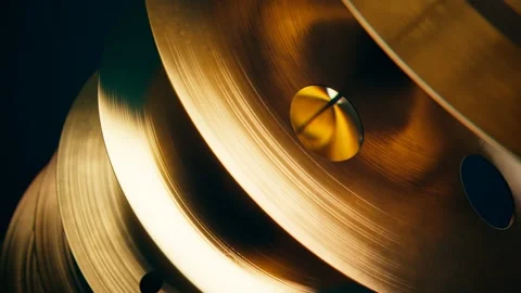 Shiny hand made drum plates. Percussion elements. Musical cymbals side view. Stock Footage 201113081