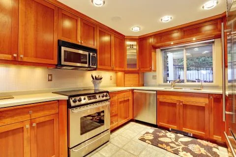 Shiny kitchen room interior with small window Stock Photos