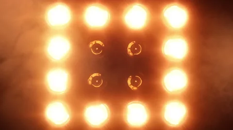 Shiny lights turning on and off. Stage lights. Amber. Stock Footage 59582319