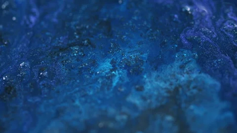 Shiny liquid glitter ink spill blue paint fluid Video stock 278201909
