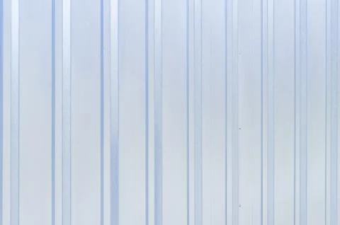 Shiny metal surface background with vertical lines Stock Photos