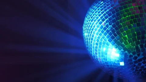 Shiny mirror disco ball with multicolored light rays in the background. Stock Footage 342256047