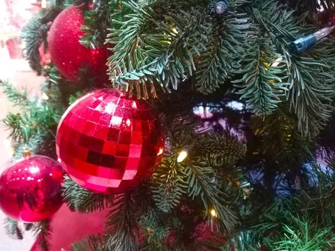 Shiny multi-colored Christmas tree toys background Stock Photos