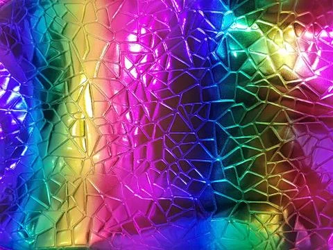 A shiny neon colored surface with many small triangular shaped cells. Concept 库存照片