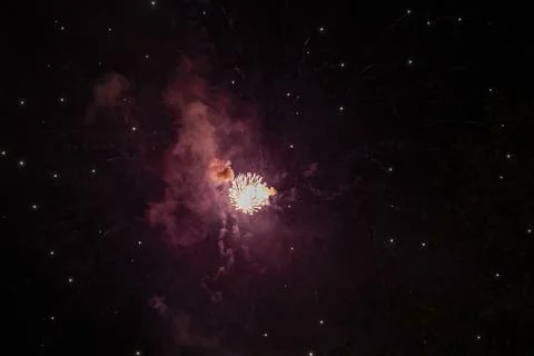 Shiny orange firework Stock Photos
