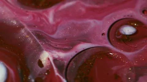 Shiny paint mix oil texture fluid glitter bubbles Stock Footage 323897155