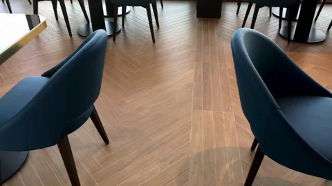 Shiny parquet made from maple with pattern of wood floor. Restaurant coffee bar Vídeos de archivo 123744885