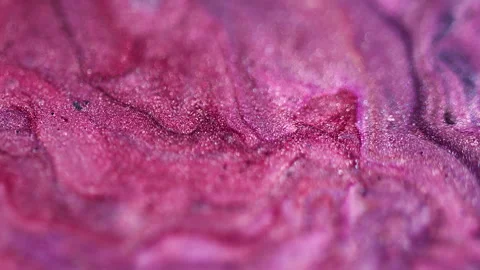 Shiny particles liquid sparkling ink wave pink mix Video stock 314720119