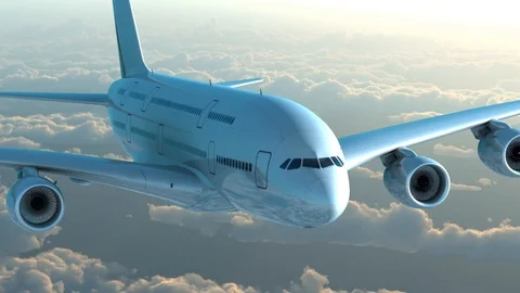 Shiny passenger plane flying on a clouds background Stock Footage 100359714