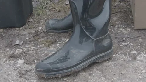 Shiny plastic boots. Stock Footage 197678179