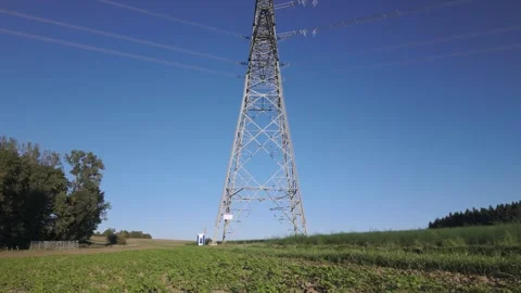Shiny power cables against the clear blue sky Stock Footage 344796813