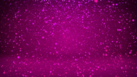 Shiny purple particles or glitters fall and settle on the surface. Background or Video stock 81725708