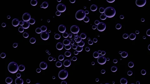 Shiny purple soap bubbles blowing quickly against a black background. Stock Footage 153284003