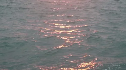 Shiny, red waves at sunset Stock Footage 161436484