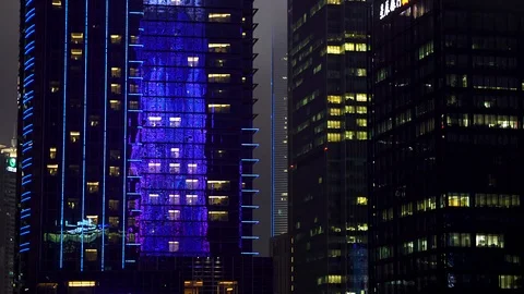 Shiny reflective sci-fi scyscapers in downtown Asian metropolis panning Stock Footage 93648409