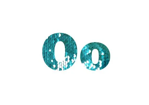 Shiny sequins background. Shot through the cut-out silhouette of the letter O Stock Photos
