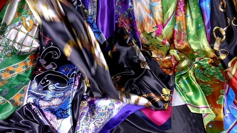 Shiny silk scarf on display Stock Footage 99325742